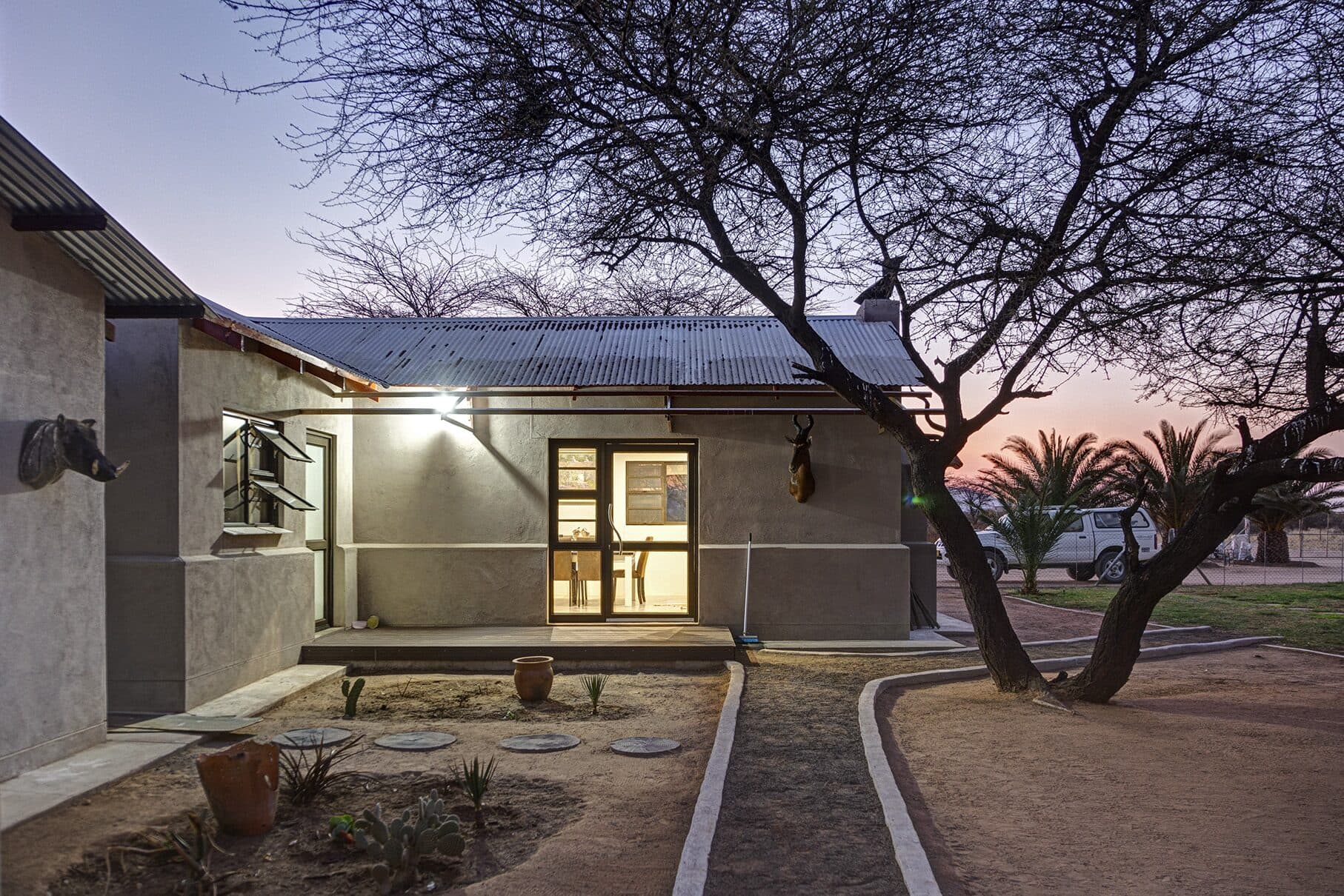 Guest rooms lit up at dusk