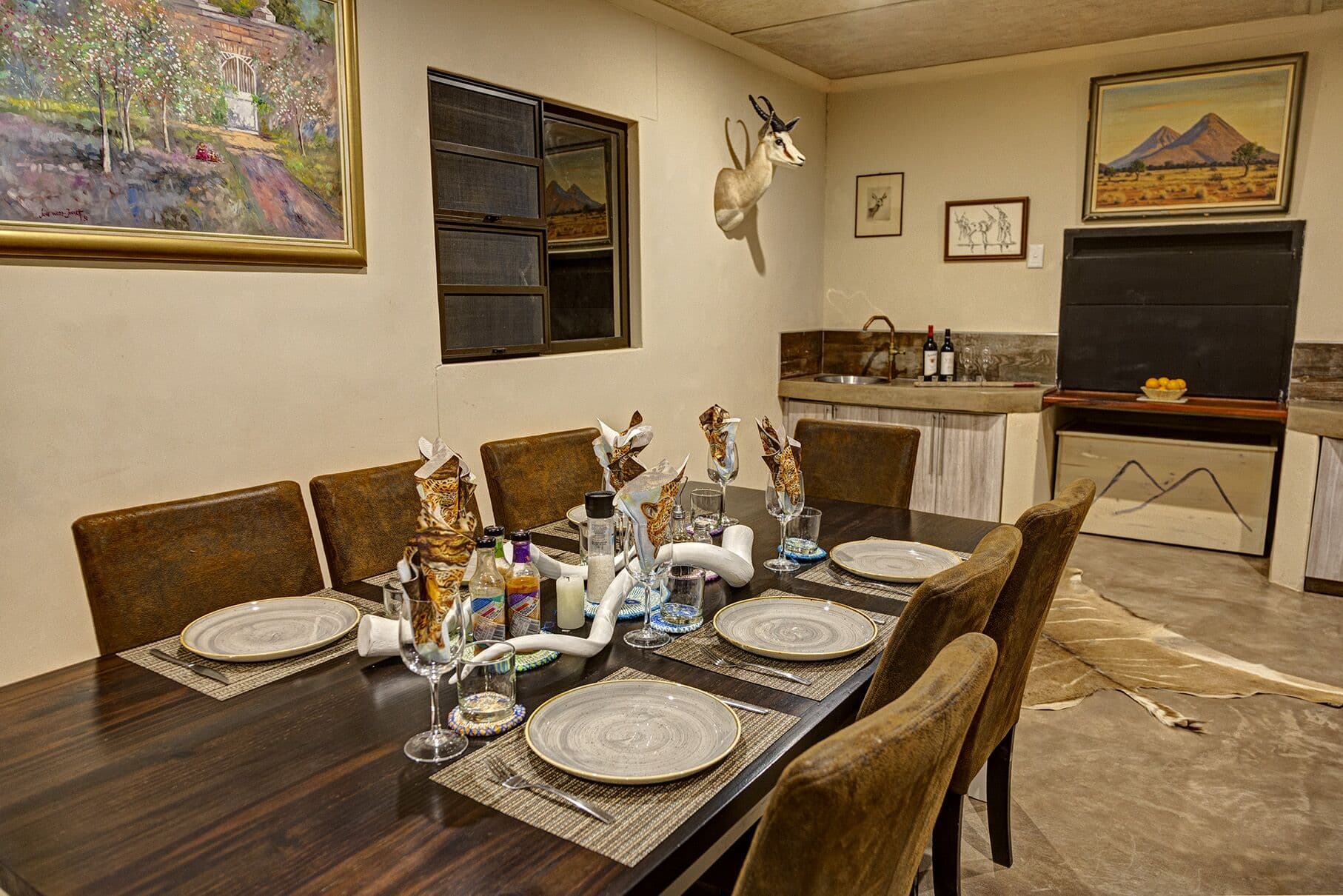 The dining room set for dinner